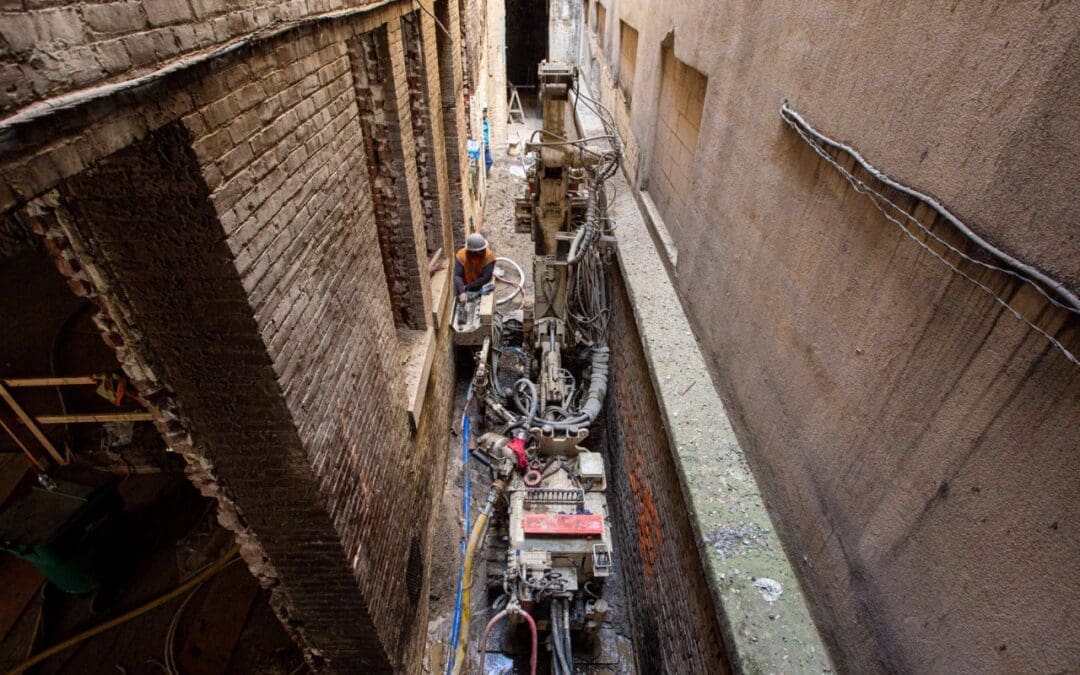 Commacchio MC-4D performs micropile work in an extraordinarily narrow alley between buildings in portland, oregon.