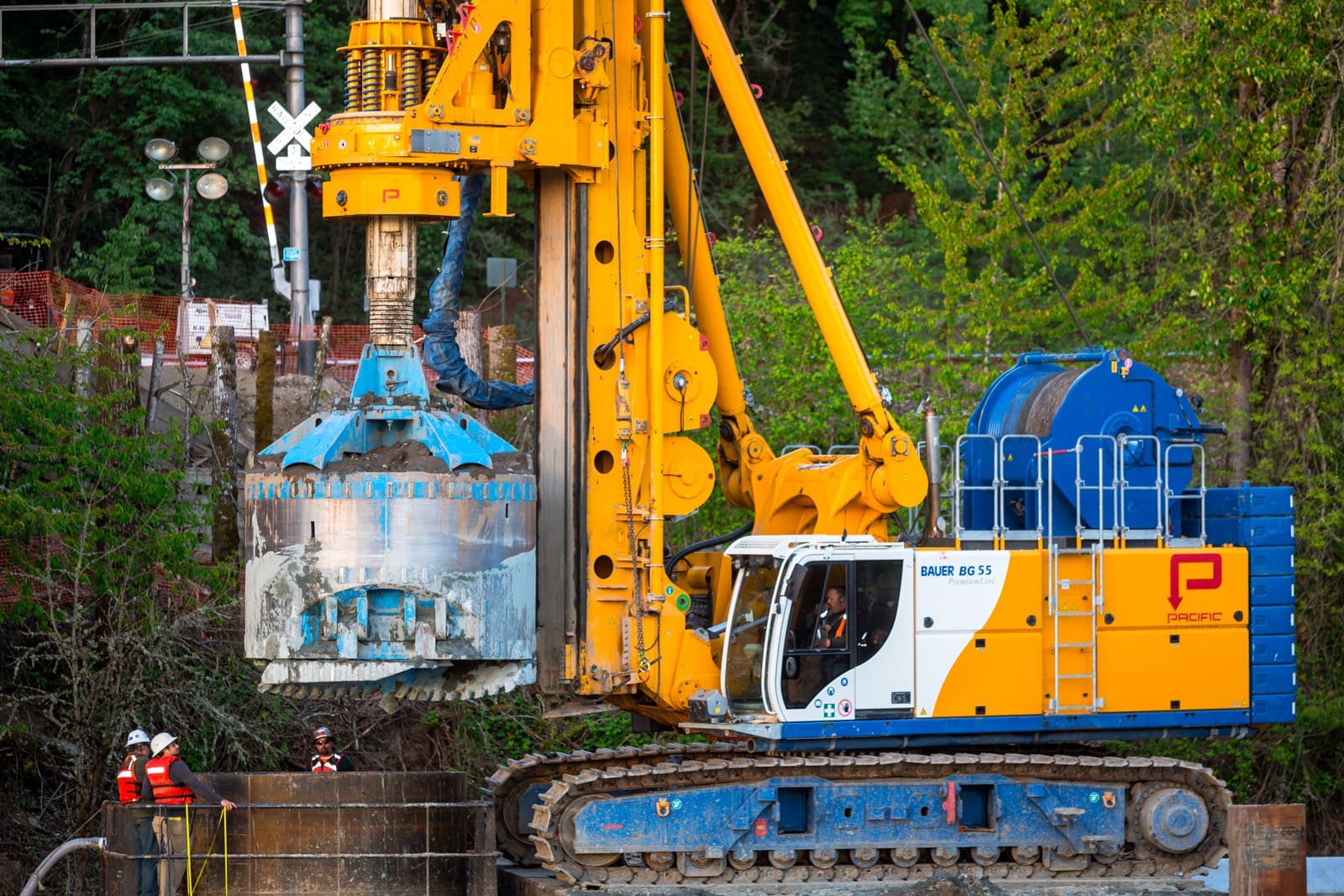 Pacific Foundation crew and drilling equipment on a construction site Pacific Foundation crew and drilling equipment on a construction site